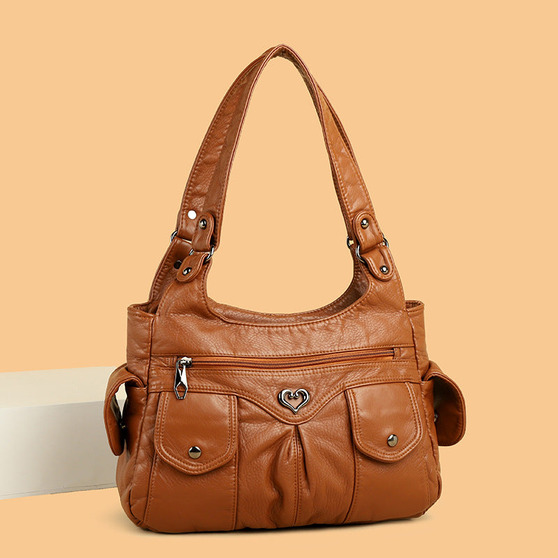 Sac à bandoulière pour femmes au design souple et fonctionnel