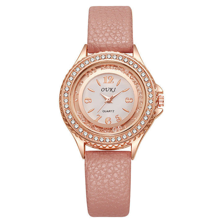 Montre femme ronde avec lunette en cristal