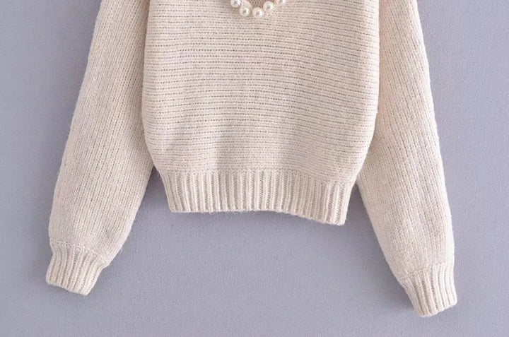 Angèle - Pull-over chic et décontracté à fausse perle
