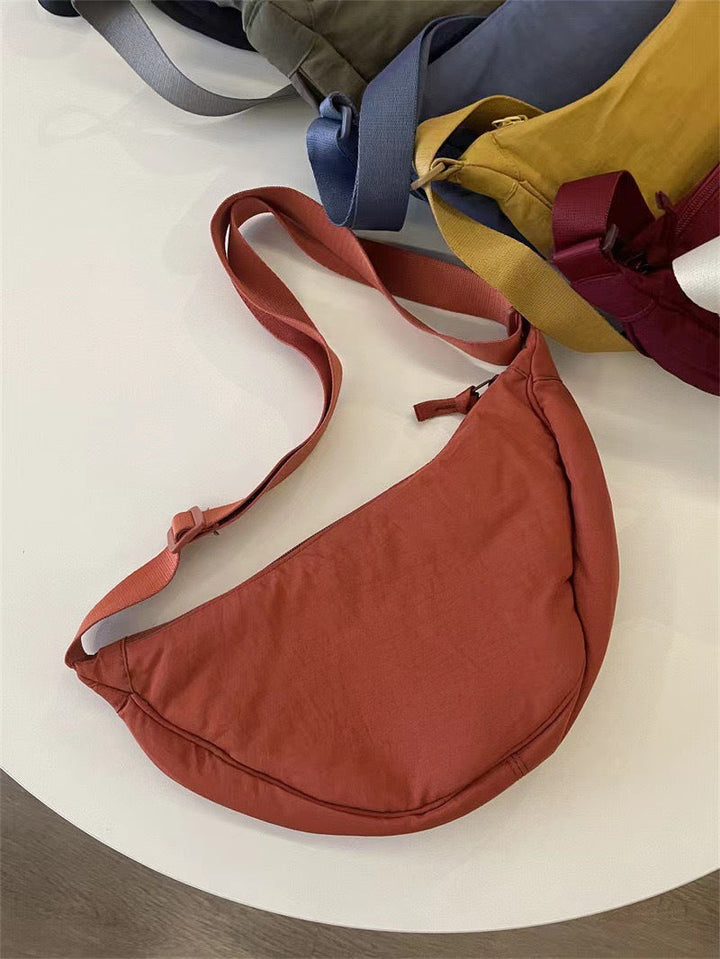 Sac à bandoulière pour femme, forme arrondie, bandoulière réglable - Clémence