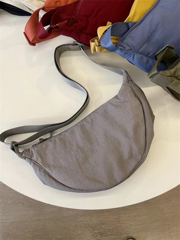 Sac à bandoulière pour femme, forme arrondie, bandoulière réglable - Clémence