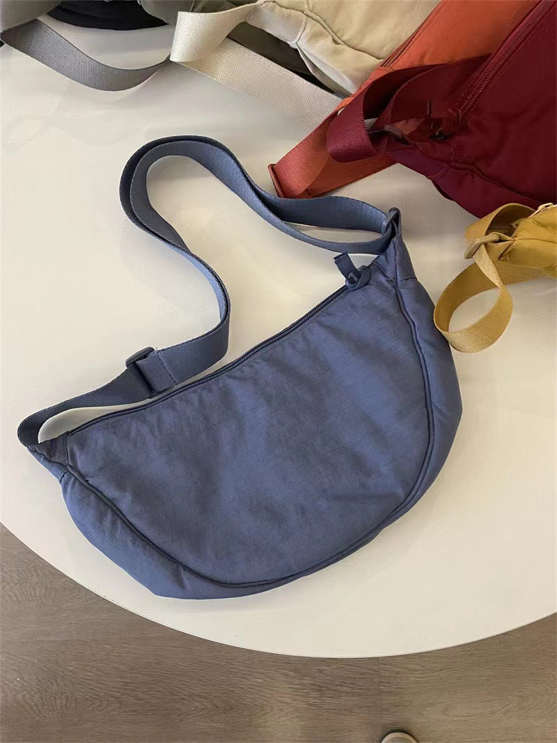 Sac à bandoulière pour femme, forme arrondie, bandoulière réglable - Clémence