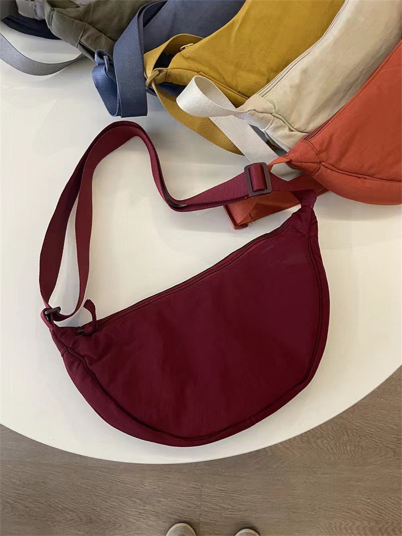 Sac à bandoulière pour femme, forme arrondie, bandoulière réglable - Clémence