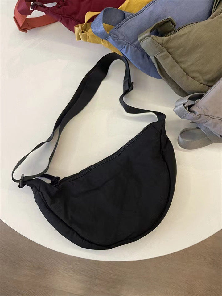 Sac à bandoulière pour femme, forme arrondie, bandoulière réglable - Clémence