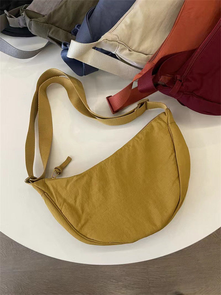Sac à bandoulière pour femme, forme arrondie, bandoulière réglable - Clémence