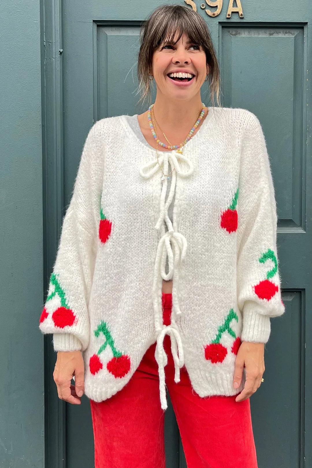 Cardigan en mélange de mohair avec nœuds sur le devant et motif cerises - Fenja
