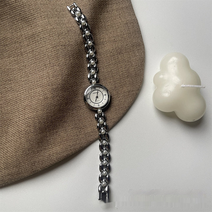 Montre-bracelet pour femme avec bracelet métallique et perles