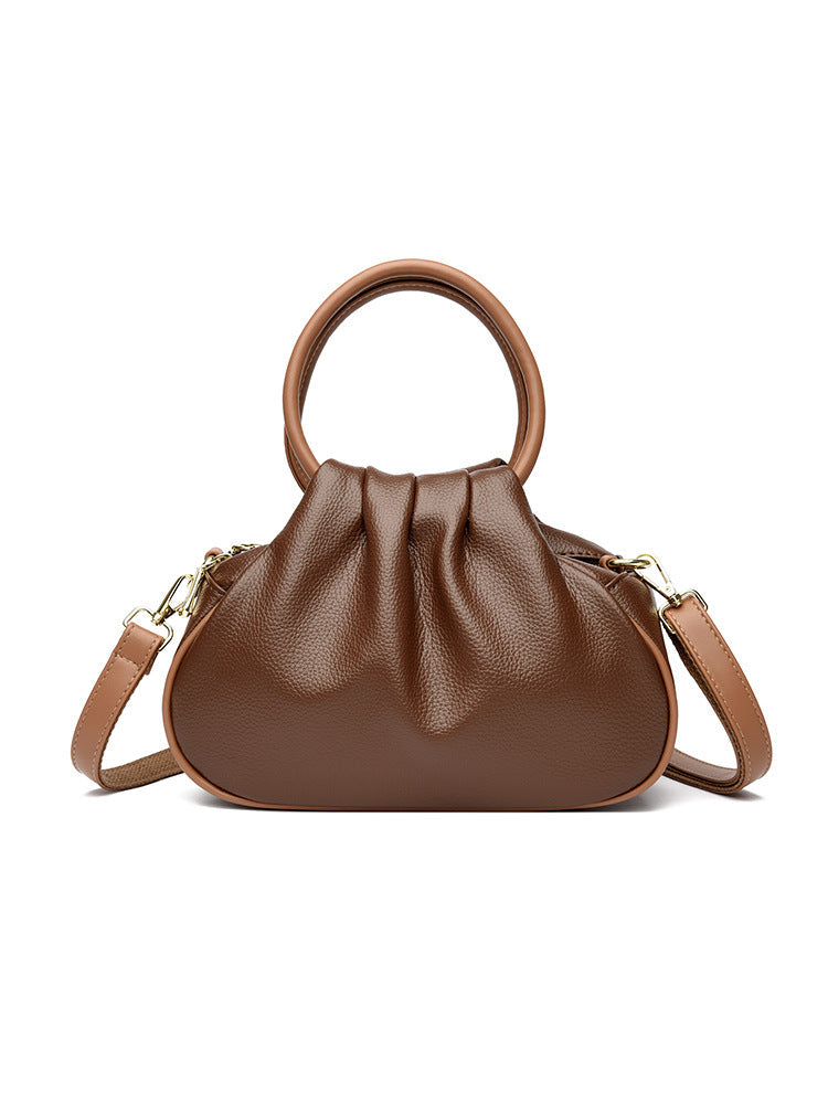 Sac à bandoulière pour femme avec plis et poignées rondes rigides