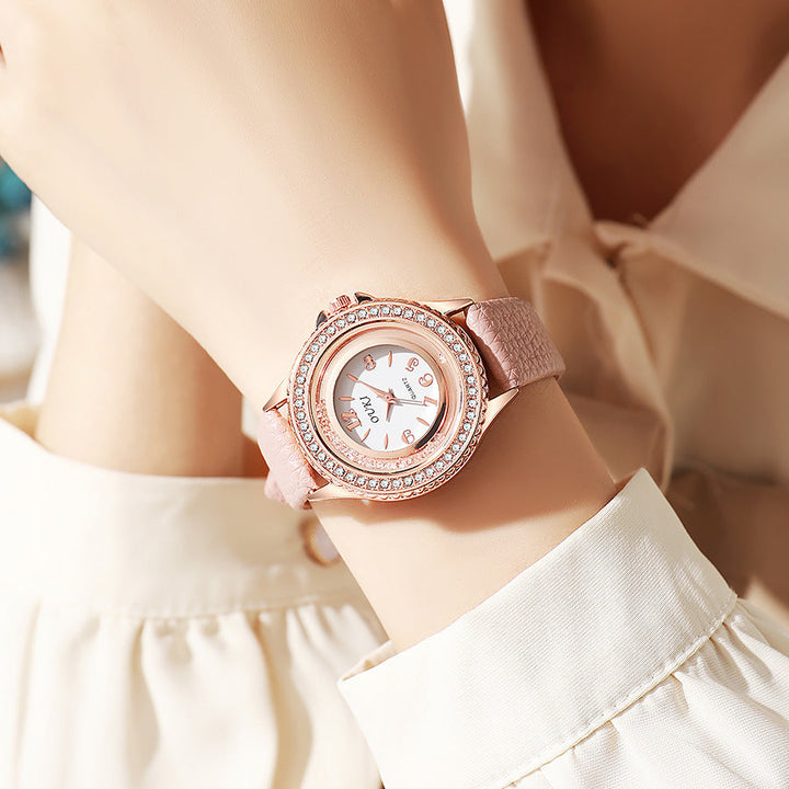 Montre femme ronde avec lunette en cristal