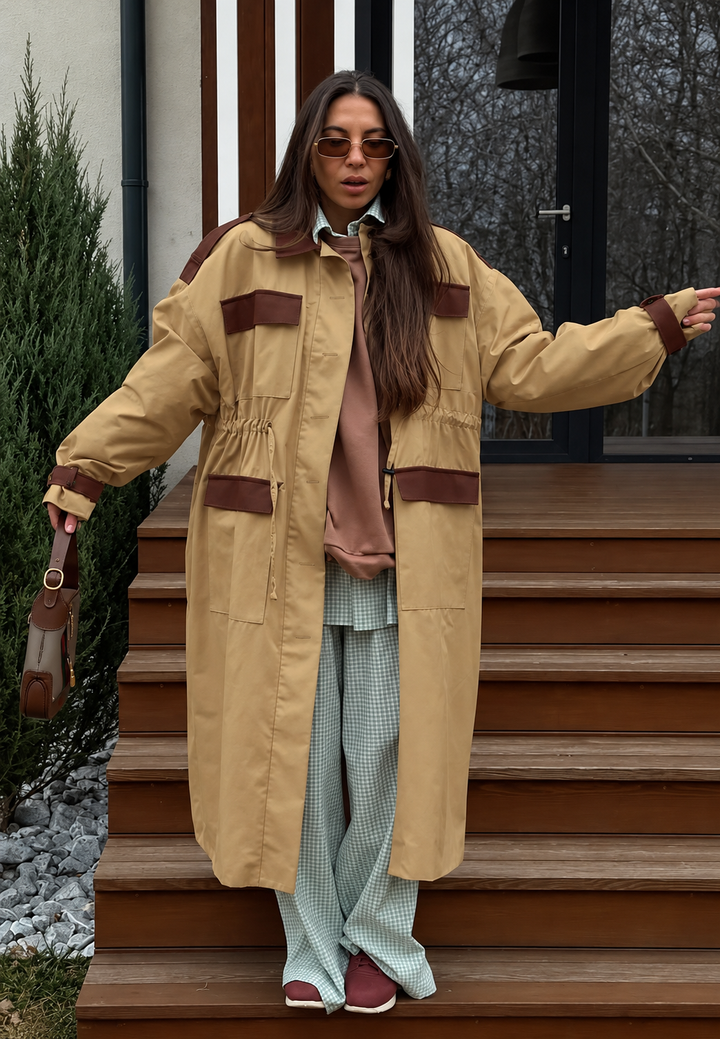 Parka femme longue à poches cargo et taille ajustable - Alondra